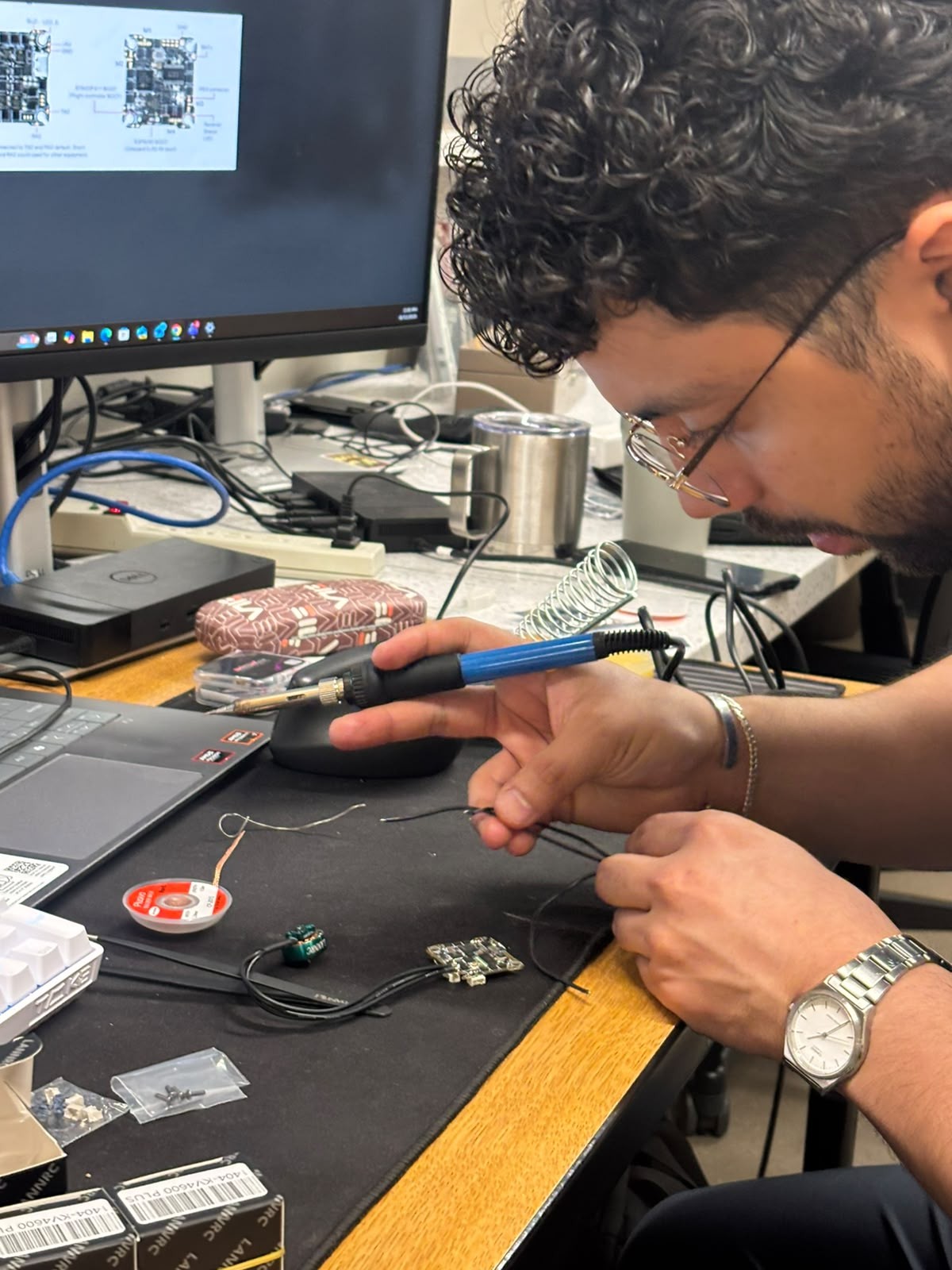 S.U.N. member soldering electronics